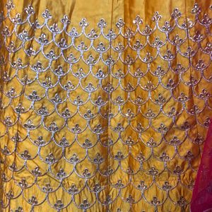 Silk Lehnga And Blouse With Net Dupatta