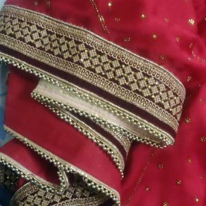 Party Wear Red Saree With Maroon Border And Latkan