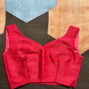 Red Sleeveless Blouse