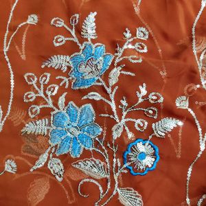 Beautiful Design Light Rust Color Saree