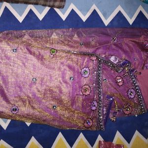 Net saree in purple colour havingg 2 shining shade