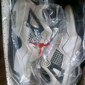 Nike Air Jordan 4 (Brand New With Box) Unused.