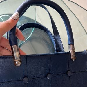 Elegant Blue Textured Spacious Handbag