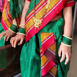 Nauvari Saree with Half Sleeves Zari Blouse