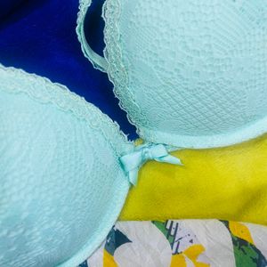 Light Green Color Puffy Bra Under Plastic Frame