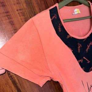 Orange colour Tshirt with pocket.