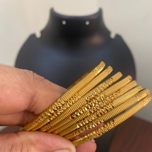 One Gram Gold Plated Bangales Very Reasonable Price .6 Month Colour Garantee Pack Of 8 .size 2.4 ,2.6,2.8 Available offer Offer Offer