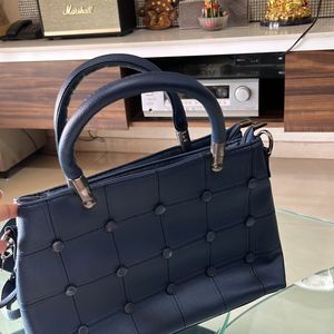 Elegant Blue Textured Spacious Handbag