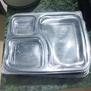 4 Plastic Plates And 1 Container