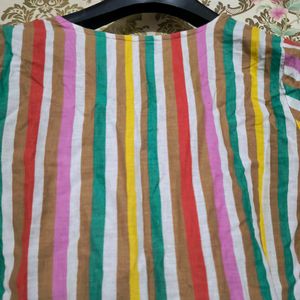 Its a Multicolour Kurti. Looks Beautiful