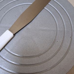 Turntable With Icing Spatula