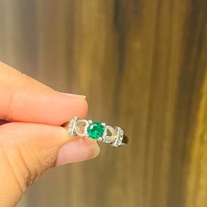 Green Stoned Ring With hearts on sides