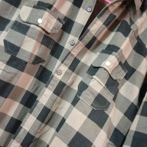 A Checkered Black And white Shirt With Full Sleeve