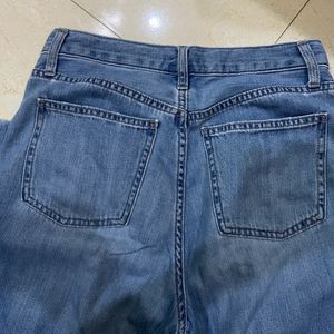 Uniqlo Raw Hem Flared Denim.