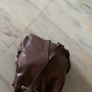 Brown leather backpack