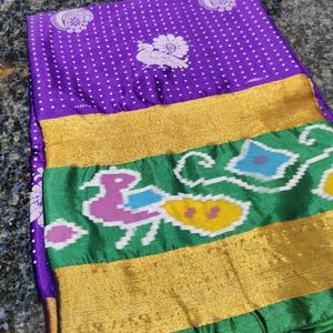 A Beautiful Violet Ikkath Border Saree