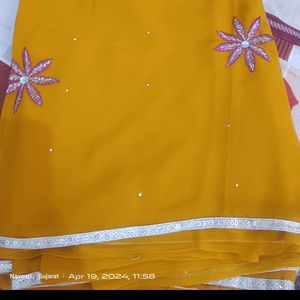 A Gold Yellow Saree With Beautiful Print