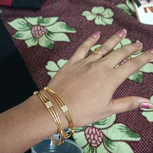 Real gold look bangles with stone work