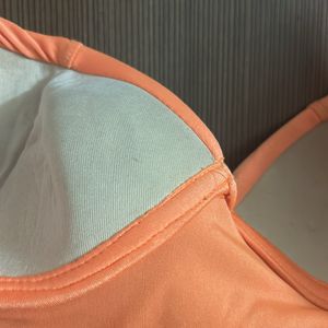 Pretty Padded Orange Trikini With Side Cuts