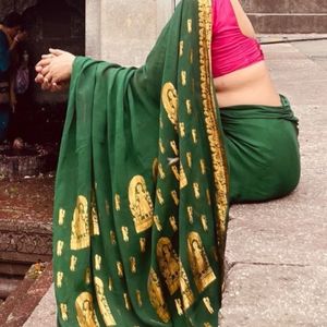 Green Saree With Pink Sleevless Blouse