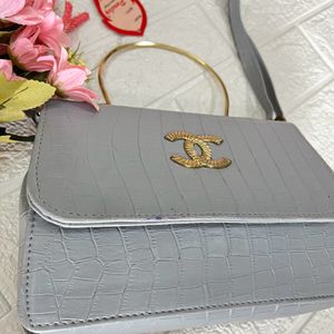 Grey croco pattern handbag/slingbag