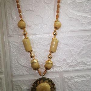 Beige coloured beads necklace neckpiece