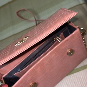 Tory burch clutch first copy