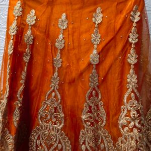 Orange And Golden Embroidered Lehenga