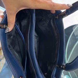 Elegant Blue Textured Spacious Handbag