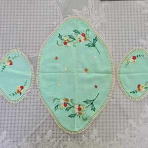 A Set of 3 hand embroidered table mats