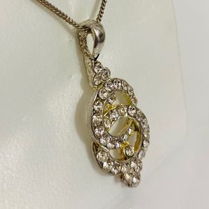 Pendant with studs