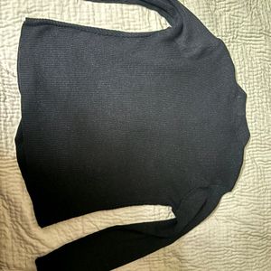 A Classic Black Crewneck Sweater