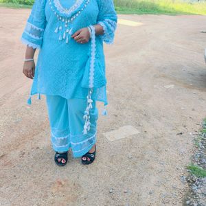 Beautiful Kurta With Pant And Potli