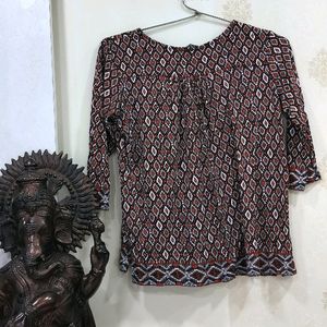 Red Printed Tie-up Neck Blouse