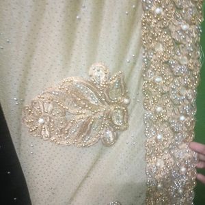 Brown Colour Saree With Cream Net