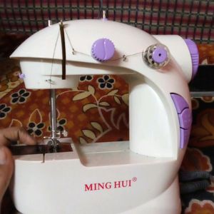 MINI SEWING MACHINE