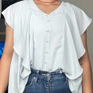 light blue frilled top