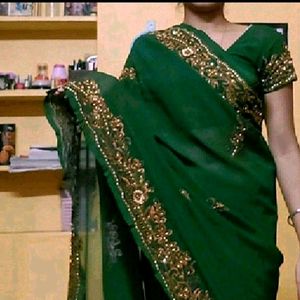 green heavy stone work saree