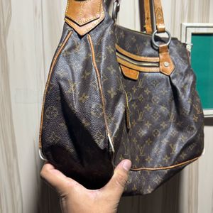 Louis Vuitton Evora Monogram Shoulder Bag