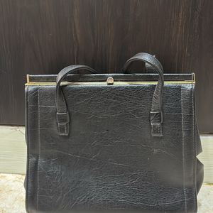 Thrifted Leather Hand Purse