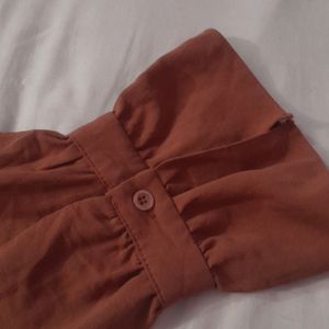 A Maroon Shirt For Women.