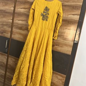 A Yellow Kurta Set With Long Trail