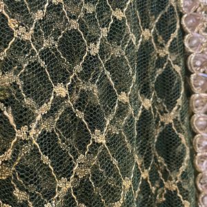 😍Elegant Green And Gold Net Saree With Lace Borde