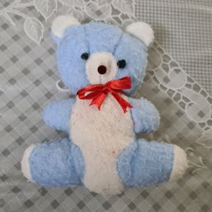 Sky Blue Teddy Bear with Red bow...a Stuffed Toy