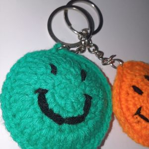 Pack Of Two Smiley Keychain Green And Orange