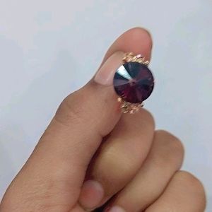 A Beautiful Ring Which Has Purple Emerald