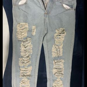 Distressed Jeans With Chain Detail