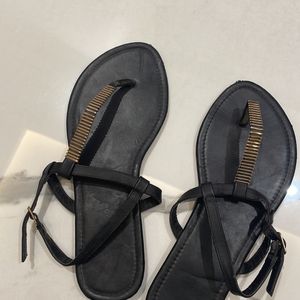 Black And Golden T Strap Sandals