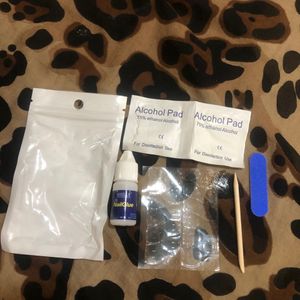 Application kit for artificial nails.