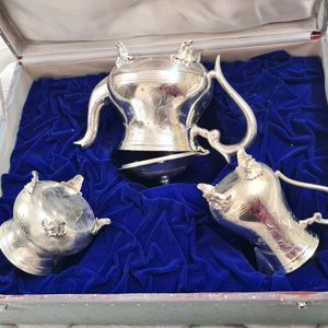 Antique Tea Set with silver polish